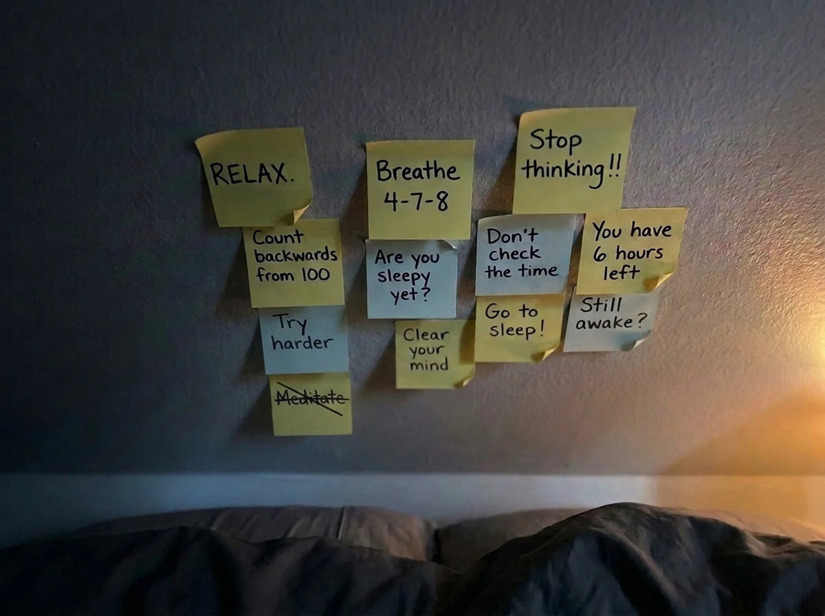 Bedroom wall covered in sticky notes: Relax, Breathe 4-7-8, Stop thinking, Try harder, Meditate crossed out